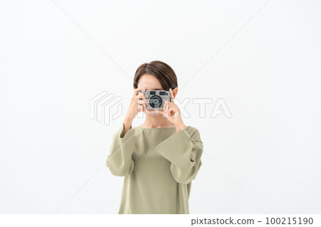 Female camera white background Female camera white background 100215190