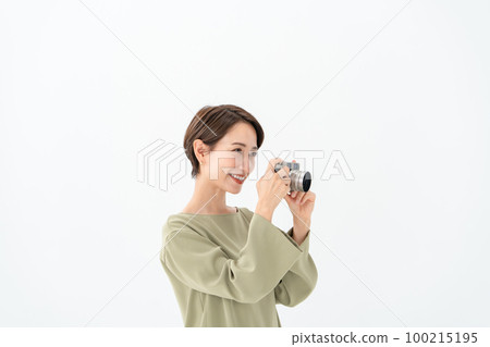 Female camera white background Female camera white background 100215195