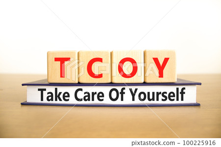 TCOY take care of yourself symbol. Concept words TCOY take care of yourself on wooden block on beautiful white background. Business TCOY take care of yourself concept. Copy space. TCOY take care of yourself symbol. Concept words TCOY take care of yourself on wooden block on beautiful white background. Business TCOY take care of yourself concept. Copy space. 100225916