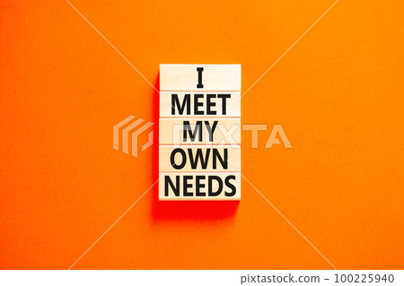 I meet my own needs symbol. Concept words I meet my own needs on wooden blocks. Beautiful orange table orange background. Business and i meet my own needs concept. Copy space. 100225940