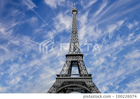 Eiffel Tower against the background of a beautiful sky with clouds. Paris, France Eiffel Tower against the background of a beautiful sky with clouds. Paris, France 100226074