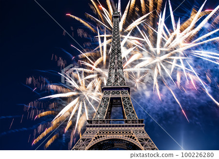 Celebratory colorful fireworks over the Eiffel Tower in Paris, France Celebratory colorful fireworks over the Eiffel Tower in Paris, France 100226280