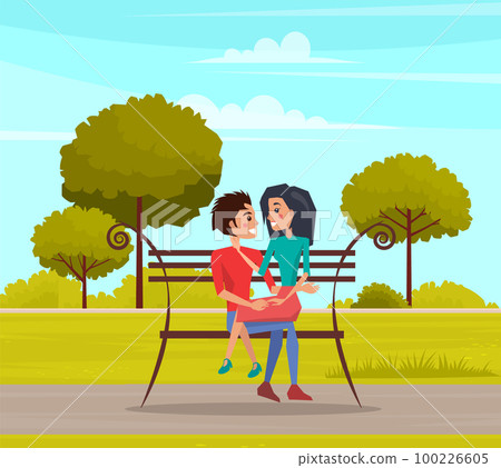 Couple on romantic date outdoors sitting on bench together. Girl and guy spend time in city garden Couple on romantic date outdoors sitting on bench together. Girl and guy spend time in city garden 100226605