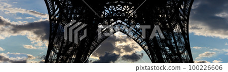Eiffel Tower against the background of a beautiful sky with clouds. Paris, France Eiffel Tower against the background of a beautiful sky with clouds. Paris, France 100226606