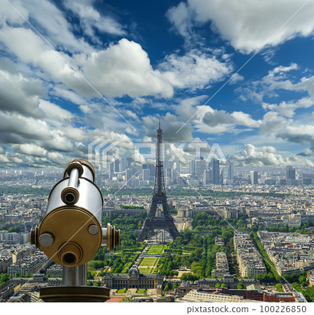 Telescope viewer and city skyline at daytime (against the background of very beautiful clouds). Paris, France. Telescope viewer and city skyline at daytime (against the background of very beautiful clouds). Paris, France. 100226850