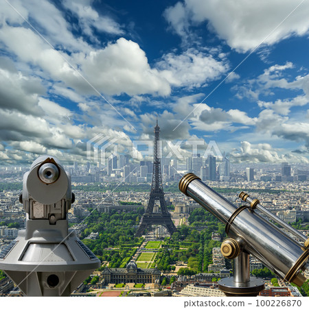 Telescope viewer and city skyline at daytime (against the background of very beautiful clouds). Paris, France. Telescope viewer and city skyline at daytime (against the background of very beautiful clouds). Paris, France. 100226870