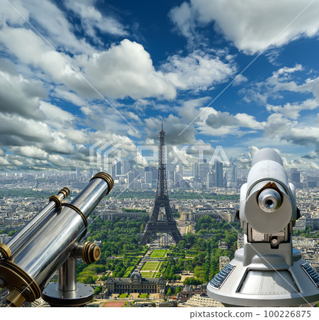 Telescope viewer and city skyline at daytime (against the background of very beautiful clouds). Paris, France. Telescope viewer and city skyline at daytime (against the background of very beautiful clouds). Paris, France. 100226875