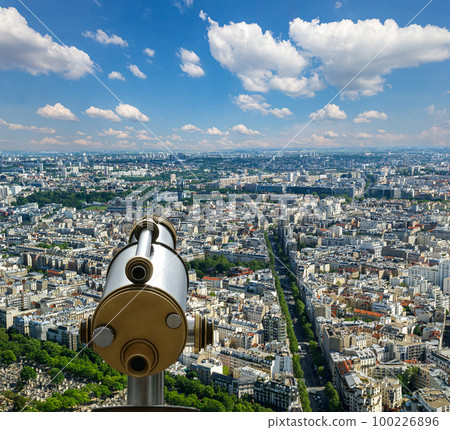 Telescope viewer and city skyline at daytime (against the background of very beautiful clouds). Paris, France. Telescope viewer and city skyline at daytime (against the background of very beautiful clouds). Paris, France. 100226896