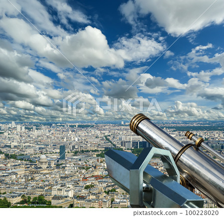 Telescope viewer and city skyline at daytime (against the background of very beautiful clouds). Paris, France. Telescope viewer and city skyline at daytime (against the background of very beautiful clouds). Paris, France. 100228020