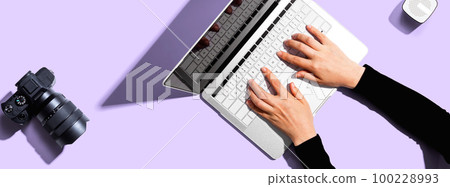 Laptop computer with a SLR camera 100228993