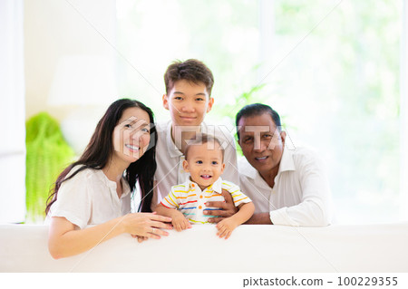 Beautiful family with kids at home 100229355