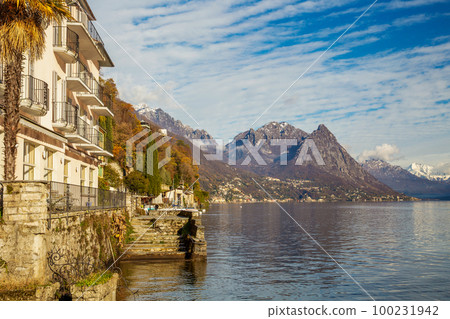 View from Gandria  village  on Lugano lake on Italian part of lake  and snow-capped European Alps 100231942