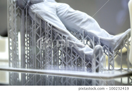 Model body of man printed on 3d printer. Object photopolymer printed on stereolithography 3D printer. Technology of liquid photopolymerization under UV light. New additive 3D printing technology 100232419