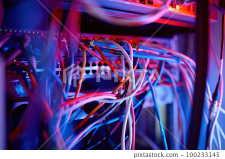 Fiber optic equipment in data center server room 100233145