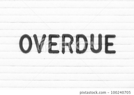 Black color letter in word overdue on white felt board background Black color letter in word overdue on white felt board background 100240705