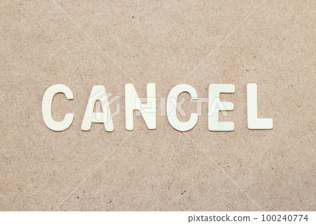 Wood alphabet letter in word cancel on wood background 100240774