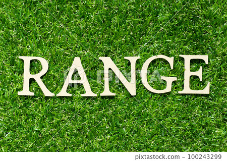 Wood letter in word range on green grass background Wood letter in word range on green grass background 100243299