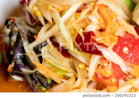 Closed up of papaya salad, with crab Thai food name Som Tum background 100243323