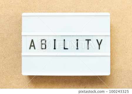 Lightbox with word ability on wood background 100243325