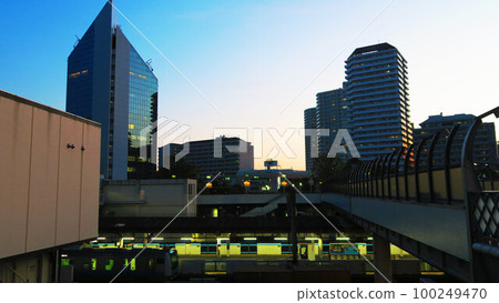 Urban landscape of buildings at dusk in the direction of the west exit of Kawaguchi Station in Kawaguchi City, Saitama Prefecture 100249470