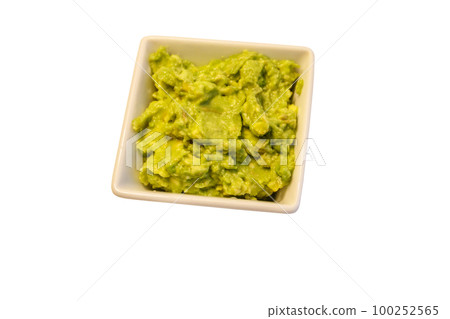 Bowl of guacamole isolated on white background 100252565