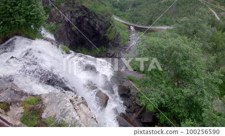 Waterfall in mountains. Outdoor nature in Norway 100256590