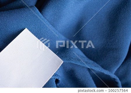 laundry care clothing label on blue dress laundry care clothing label on blue dress 100257564