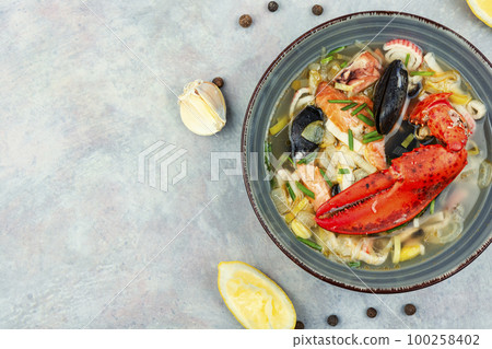 Traditional seafood soup,space for text Traditional seafood soup,space for text 100258402