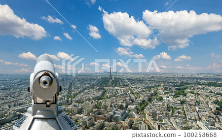 Telescope viewer and city skyline at daytime (against the background of very beautiful clouds). Paris, France. Telescope viewer and city skyline at daytime (against the background of very beautiful clouds). Paris, France. 100258668