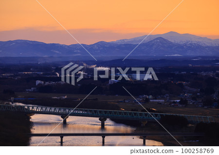 Kitakami City, Iwate Prefecture, Kitakami city area at sunset 100258769
