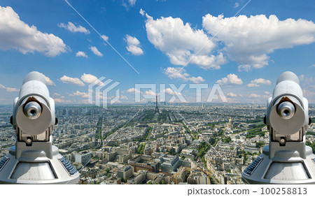 Telescope viewer and city skyline at daytime (against the background of very beautiful clouds). Paris, France. Telescope viewer and city skyline at daytime (against the background of very beautiful clouds). Paris, France. 100258813