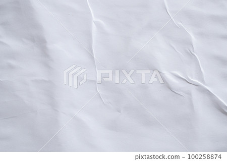 Blank white crumpled and creased paper poster texture background 100258874