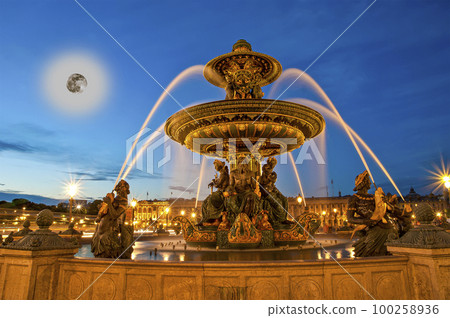 Fountain at the Place de la Concorde in Paris by night (with the moon), France Fountain at the Place de la Concorde in Paris by night (with the moon), France 100258936