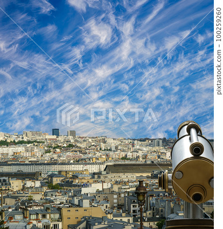 Telescope viewer and city skyline at daytime (against the background of very beautiful clouds). Paris, France. Telescope viewer and city skyline at daytime (against the background of very beautiful clouds). Paris, France. 100259260