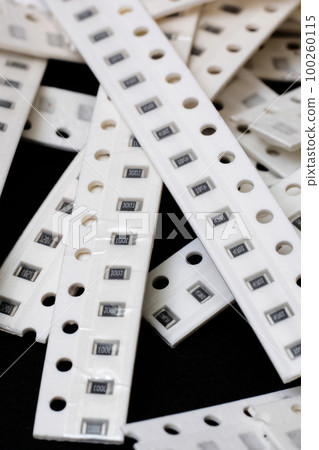 Pile of smd chip 0805 resistors close up Pile of smd chip 0805 resistors close up 100260115