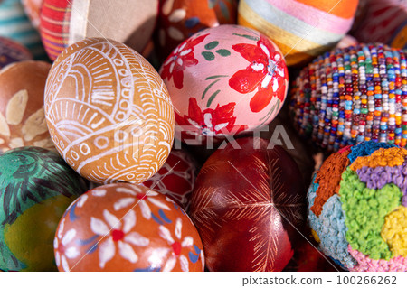 Close-up view from the top of the Easter eggs painted in various patterns. 100266262