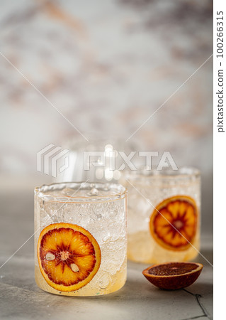 Cold water with red orange Cold water with red orange 100266315