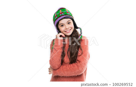 winter fashion for smiling teen girl. warm hat knitwear. teen girl model in warm hat. teen girl 100269552