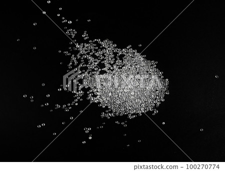 Desiccant Silica Gel Adsorbent Crystals on Black Background, Desiccant Polymer Balls 100270774