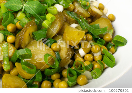 Pickled Gherkins Salad in White Bowl. Chopped Pickled Cucumbers, Canned Green Peas, Green Onions Salat Pickled Gherkins Salad in White Bowl. Chopped Pickled Cucumbers, Canned Green Peas, Green Onions Salat 100270801