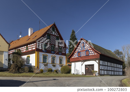 Half-timbered farmhouse, folk architecture in Doubrava, Western Bohemia, Czech Republic 100272803