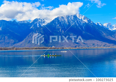 People kayaking on lake Geneva in Montreux, Switzerland 100273025