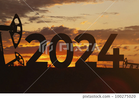 Oil production against backdrop of beautiful sunset. 2024 and oil fields. Purchase and sale of crude oil for dollar. Oil production against backdrop of beautiful sunset. 2024 and oil fields. Purchase and sale of crude oil for dollar. 100275020