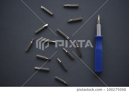 Replaceable nozzles for a screwdriver. Blue screwdriver with attachments. 100275098