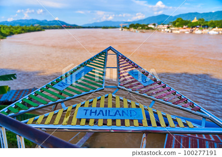 Directional Sign in Golden Triangle Pointing to Country Name 100277191