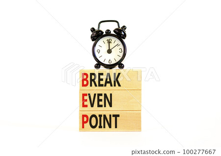 BEP break even point symbol. Concept words BEP break even point on wooden blocks on a beautiful white table white background. Black alarm clock. Business and BEP break even point concept. Copy space. BEP break even point symbol. Concept words BEP break even point on wooden blocks on a beautiful white table white background. Black alarm clock. Business and BEP break even point concept. Copy space. 100277667