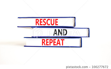 Rescue and repeat symbol. Concept words Rescue and repeat on books on a beautiful white table white background. Business rescue and repeat concept. Copy space. 100277672
