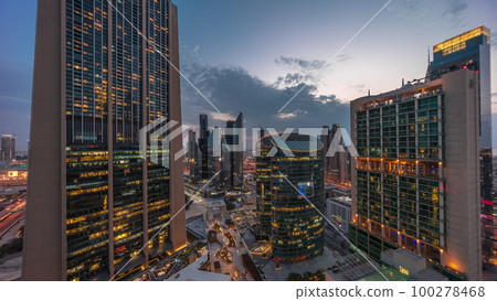 Dubai international financial center skyscrapers aerial day to night timelapse. Dubai international financial center skyscrapers aerial day to night timelapse. 100278468