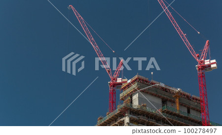 High multi-storey buildings under construction and cranes timelapse High multi-storey buildings under construction and cranes timelapse 100278497