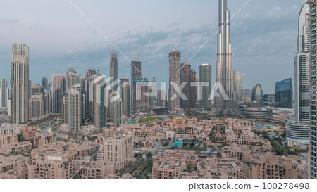 Dubai Downtown night to day timelapse with tallest skyscraper and other towers Dubai Downtown night to day timelapse with tallest skyscraper and other towers 100278498